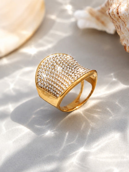 18K PVD gold CZ wide band statement ring on shell background for resort and boutique jewelry displays