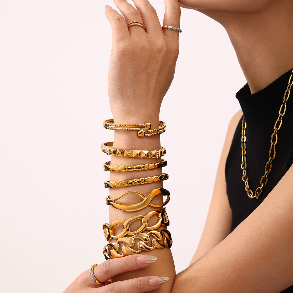 18K real gold PVD plated luxury bangle set stacked on wrist, trendy fashion styling