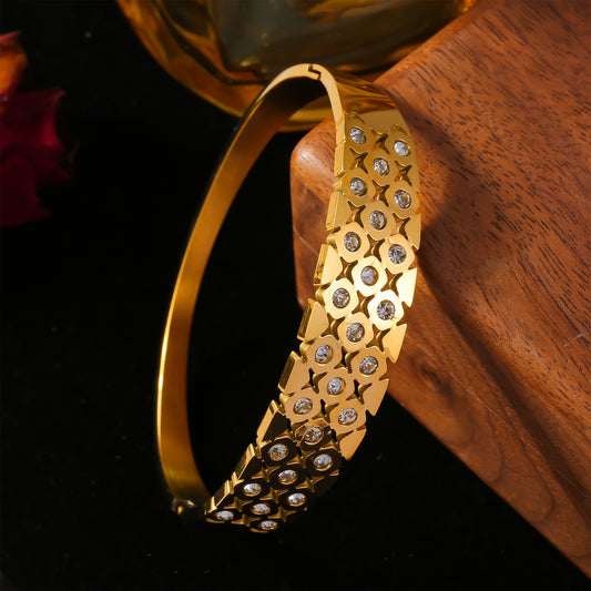 Fashionable gold plated bangle showcasing unique geometric design