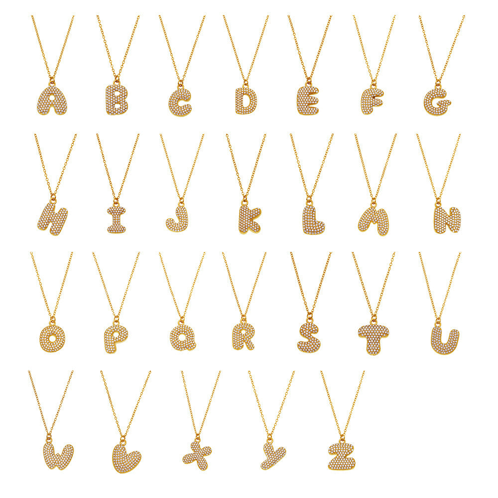 Gold A-Z initial letter necklace collection in 316L stainless steel by Miduoduo Jewelry for personalized jewelry displays