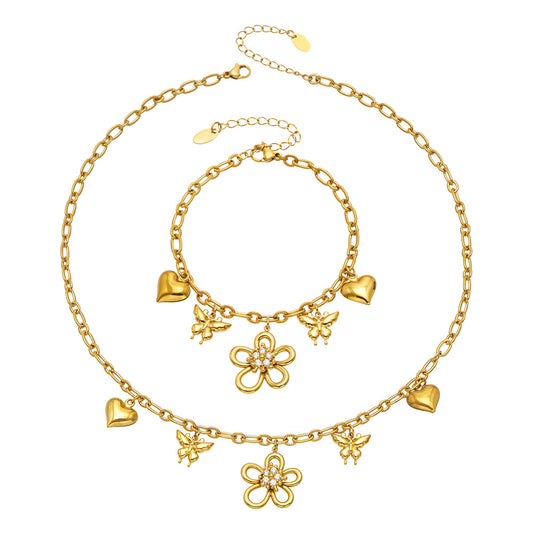 316L stainless steel floral butterfly charm necklace and matching bracelet in an 18K PVD gold finish