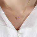 Gold / June Light Purple Zircon