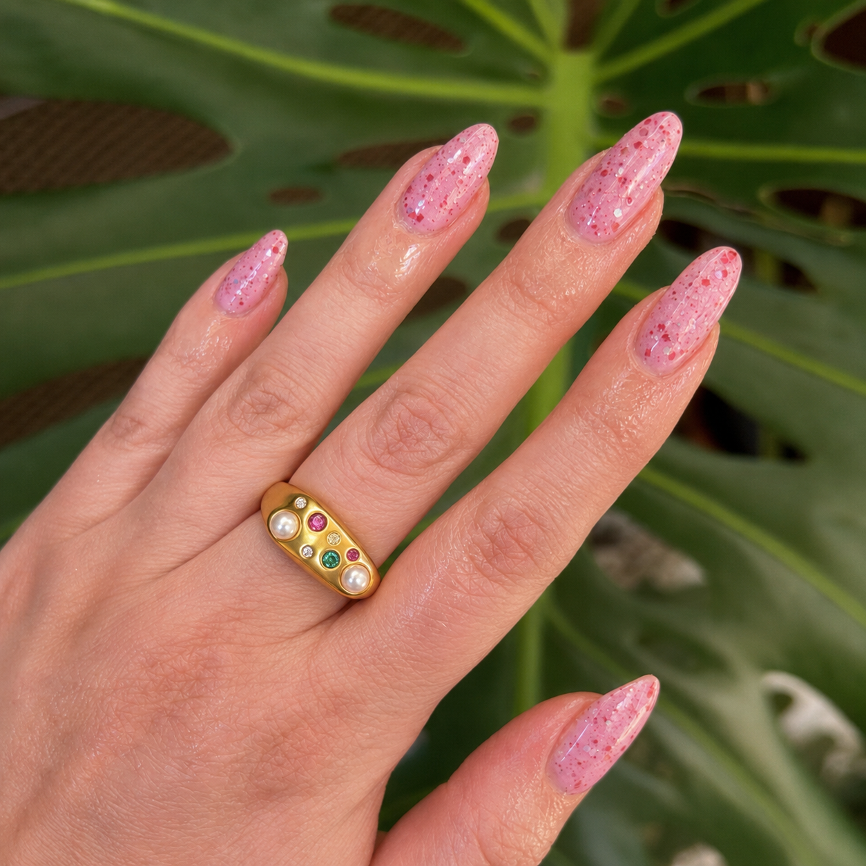 Gold pearl rhinestone open ring worn on hand with colorful rhinestones and imitation pearl accents for boutique fashion jewelry