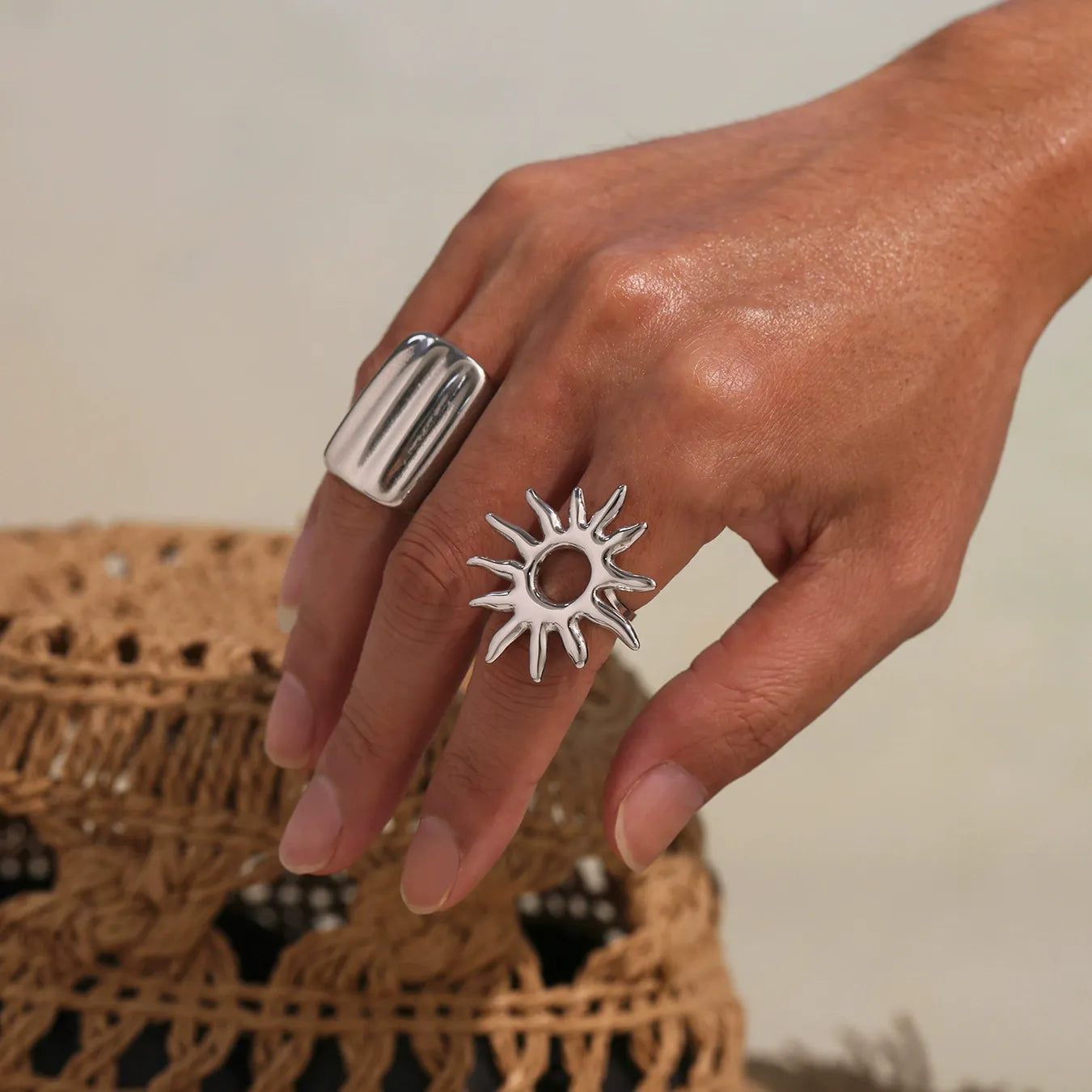 Gold wide band stainless steel ring modeled for boutique jewelry wholesale