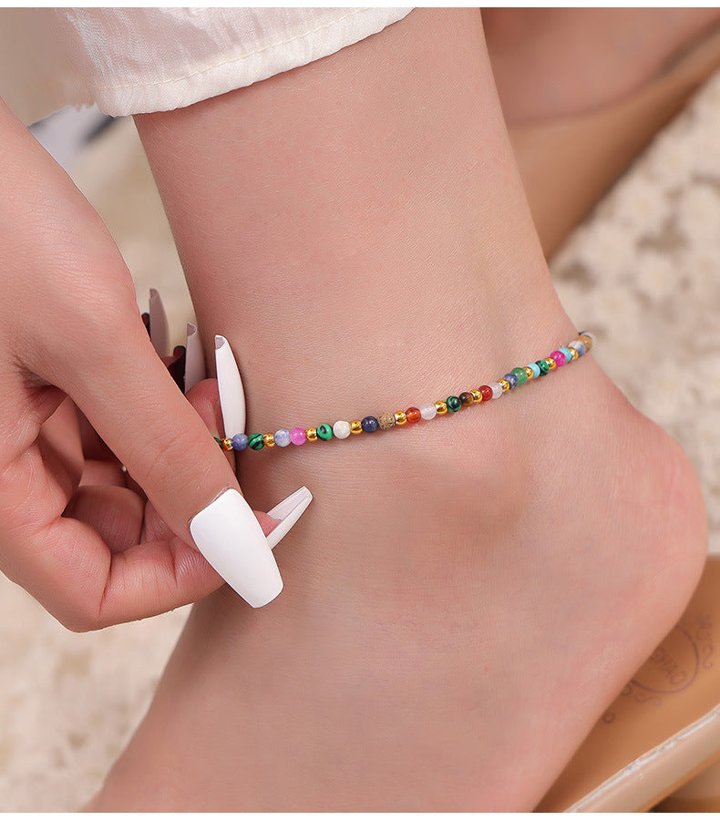 Three gold beaded anklets arranged in a row on white background, adjustable 316L stainless steel waterproof wholesale anklets for boutique display