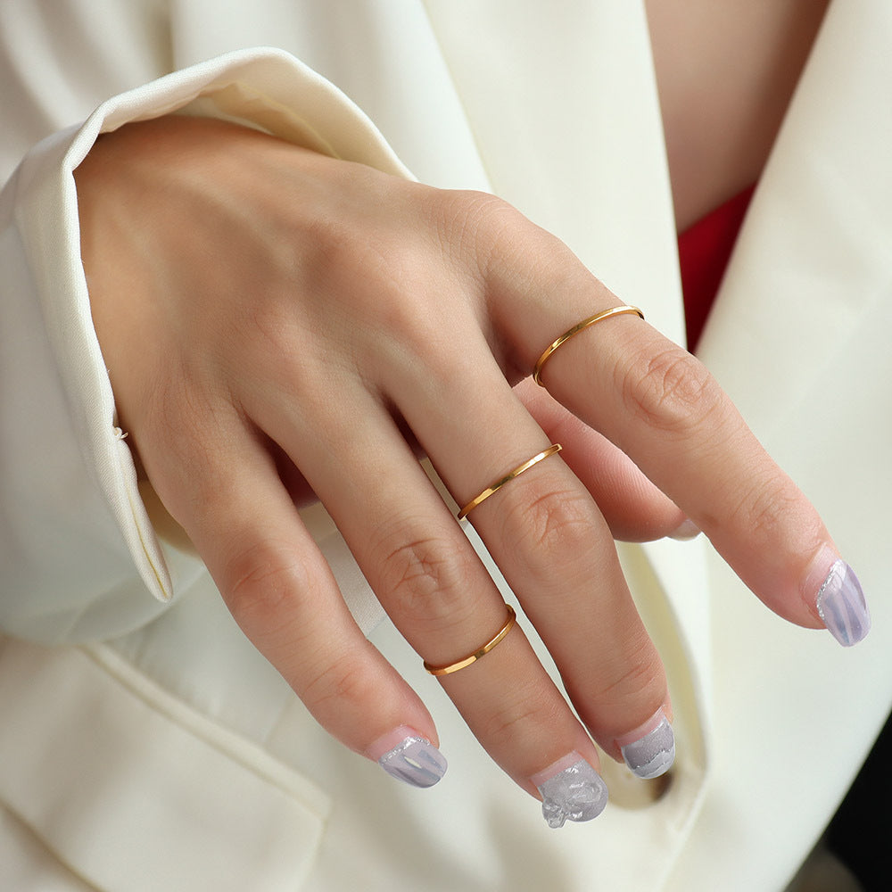 316L stainless steel 18K Gold Plated Dainty Minimalist Band Ring flat lay display for wholesale ring buyers