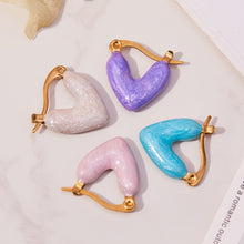 Vibrant baby blue enamel heart earrings, perfect for waterproof summer beach jewelry collections.