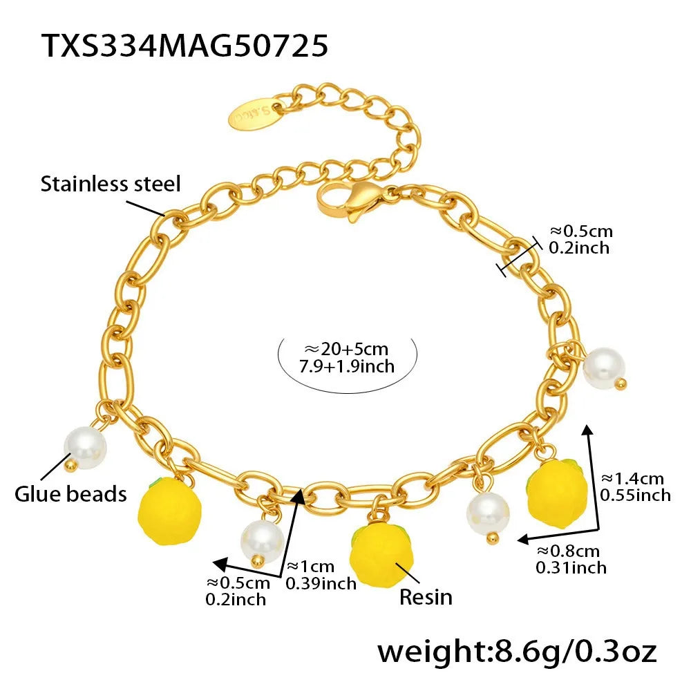 Detailed view of the hypoallergenic lemon and pearl necklace with adjustable chain length and secure clasp information.