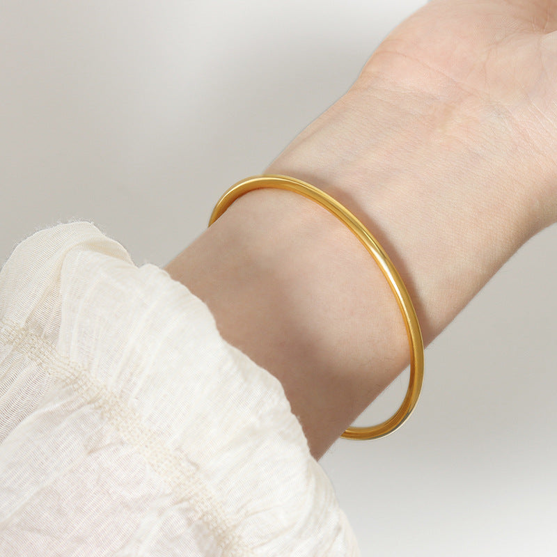 316L stainless steel 18K Gold Plated Minimalist Plain Circle Bangle Bracelet main product view for wholesale bracelet buyers