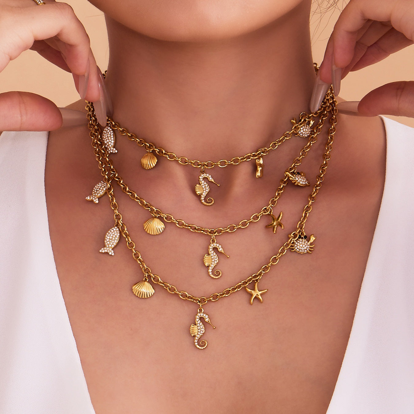 316L Stainless Steel 18K Gold Plated Sparkling Seahorse & Fish Multi-Charm Necklace & Bracelet Set - Image 4