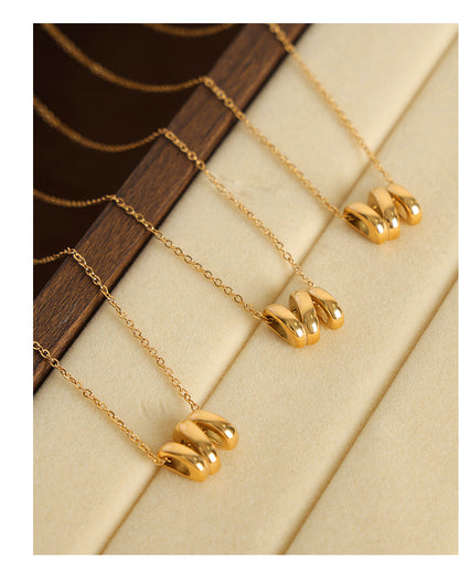 316L Stainless Steel 18K Gold PVD Geometric Twisted Pendant Necklace - Image 1