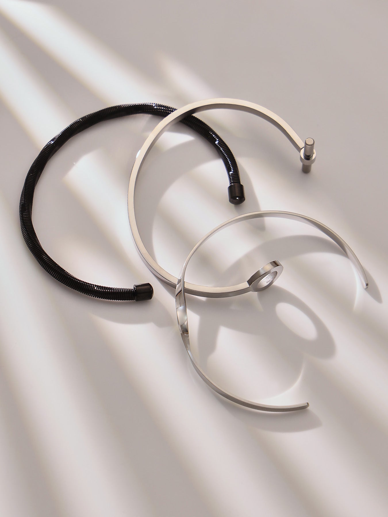 316L Stainless Steel 18K Gold PVD Interlocking Heart Hollow Geometric Bangle - Interlocking Heart, Hollow Design, Geometric, Minimalist, Modern Bangle Wholesale Stainless Steel Jewelry - Sensitive Skin Friendly - Detail 3