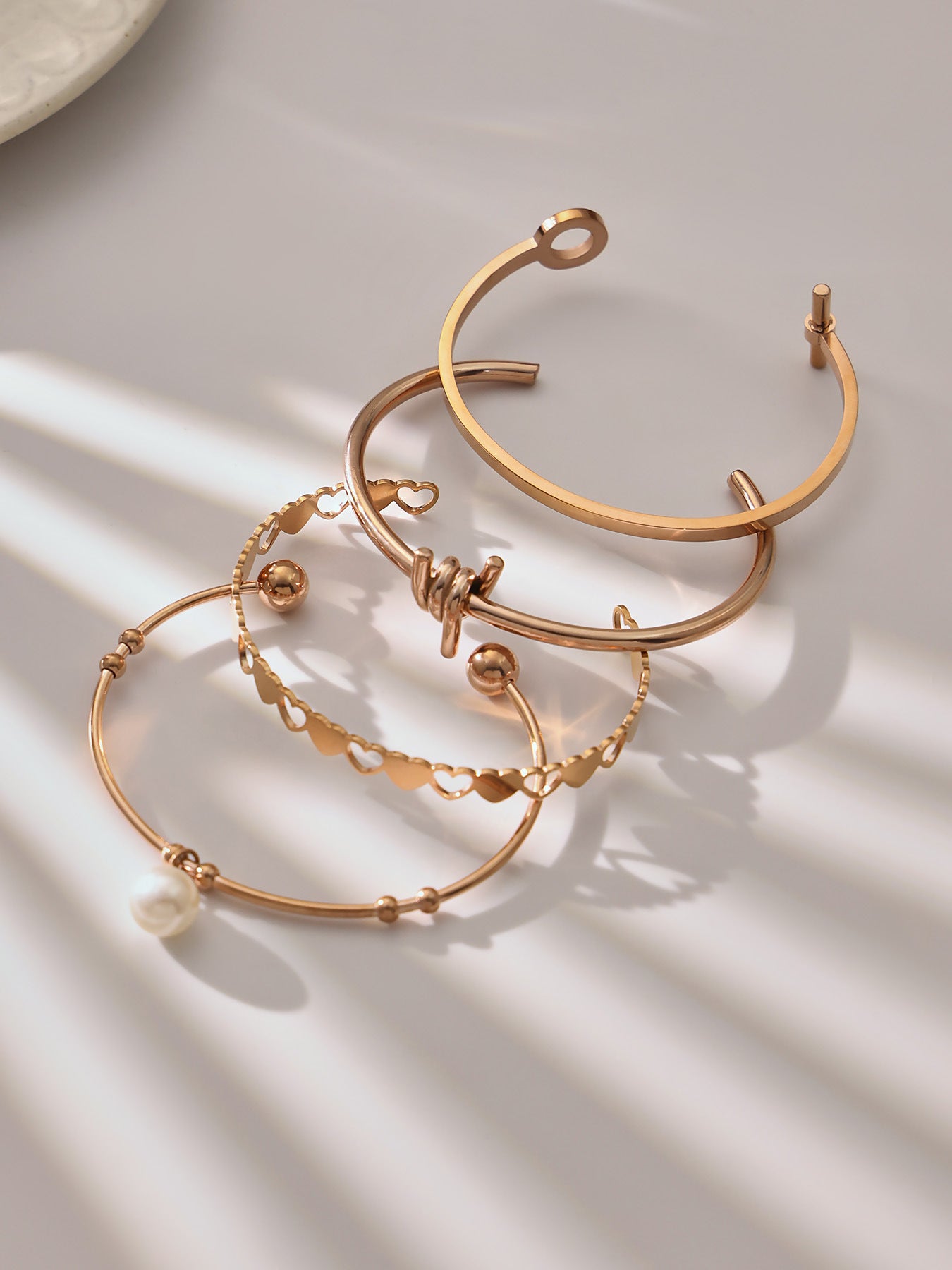 316L Stainless Steel 18K Gold PVD Interlocking Heart Hollow Geometric Bangle - Interlocking Heart, Hollow Design, Geometric, Minimalist, Modern Bangle Wholesale Stainless Steel Jewelry - Sensitive Skin Friendly - Detail 6