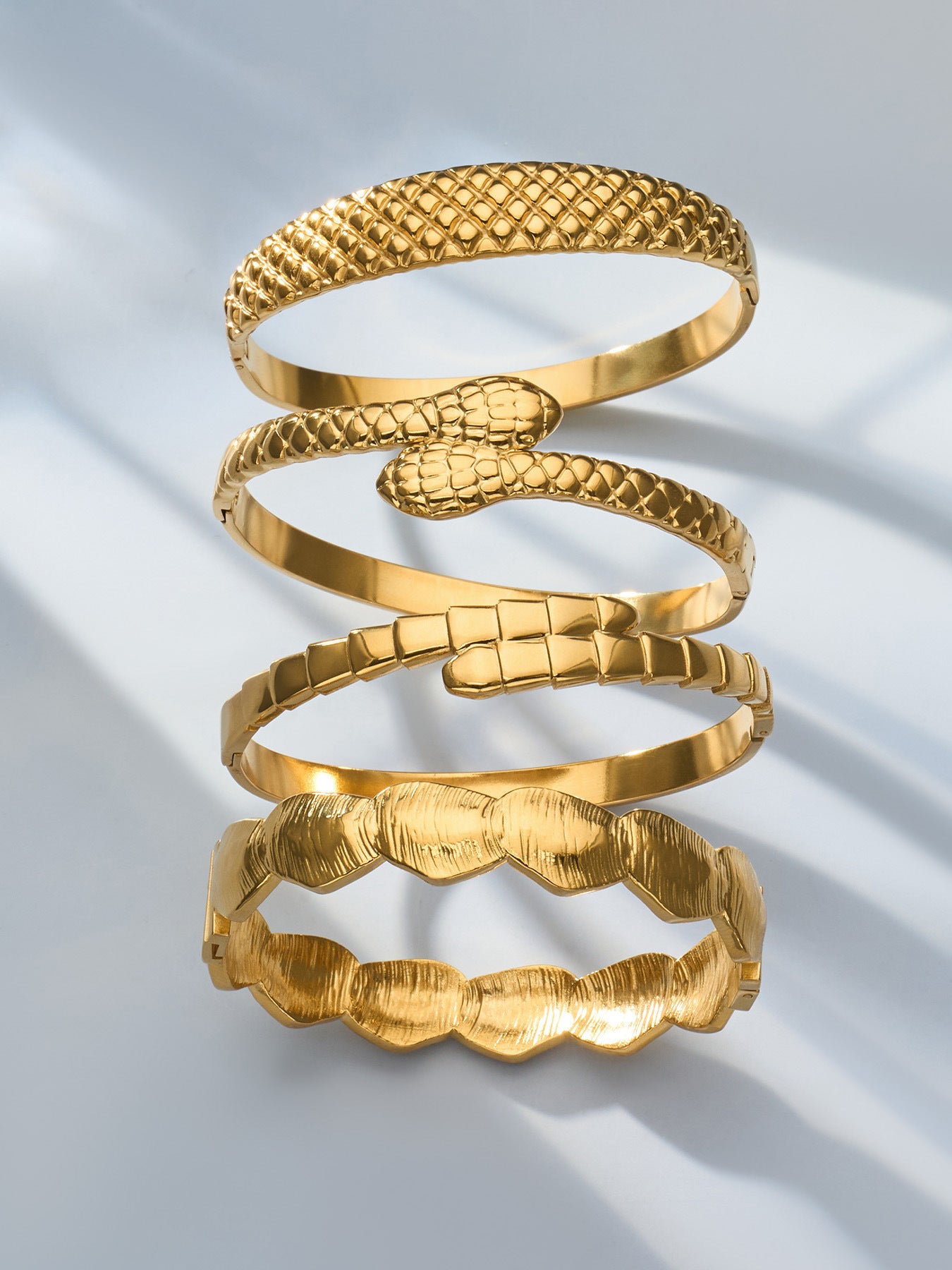 Gold Texture Open Cuff Bangle worn on wrist, 18K gold plated stainless steel jewelry