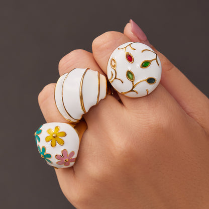 Woman Wearing Multiple Enamel Dome Rings in Floral & Stripe Designs, 316L Stainless Steel 18K Gold Plated Waterproof Statement Jewelry