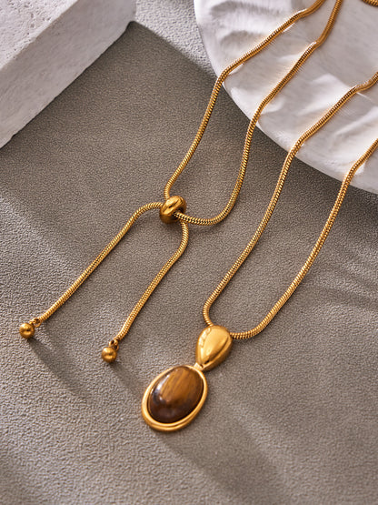 Steel Oval Stone Pendant Necklace worn on neck, minimalist stainless steel jewelry