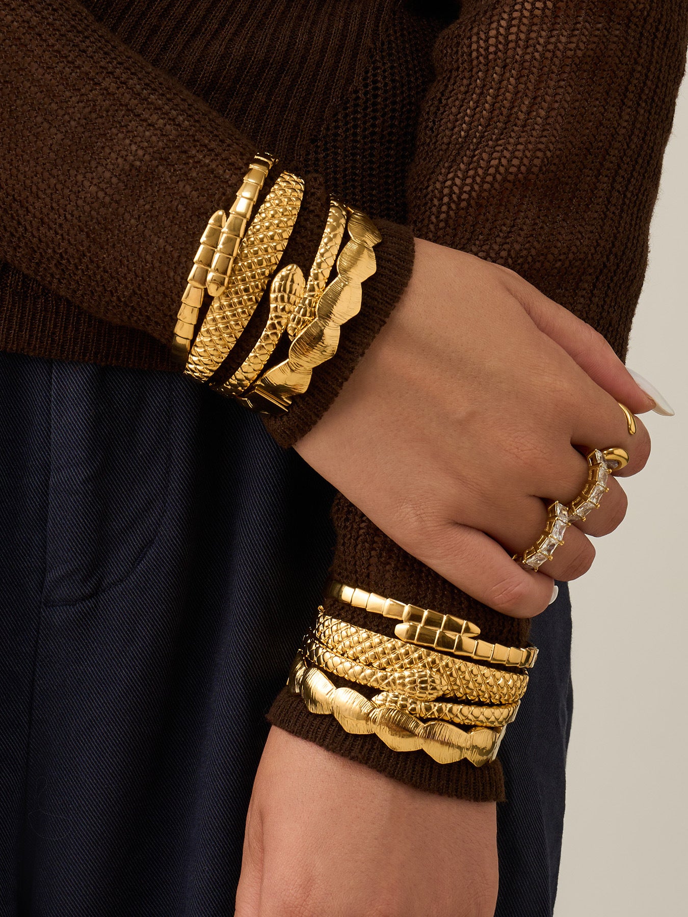 Texture Open Cuff Bangle worn on wrist, 18K gold plated stainless steel jewelry