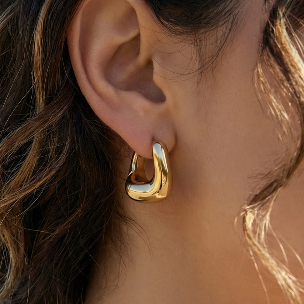 316L Stainless Steel 18K Gold PVD Oval Huggie Hoop Earrings - Oval Huggie, U-shaped, Minimalist, Elegant, 18K Gold PVD Wholesale Stainless Steel Jewelry - Sensitive Skin Friendly - Detail 11