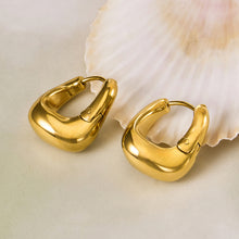316L stainless steel 18K Gold PVD Oval Huggie Hoop Earrings flat lay display for wholesale earrings buyers
