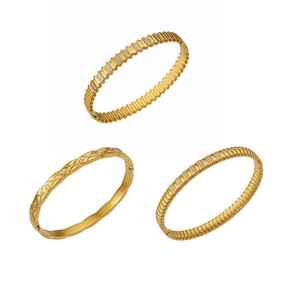 Textured snake chain bangle with diamond-cut pattern and zircon accents, 316L stainless steel 18K gold plated wholesale
