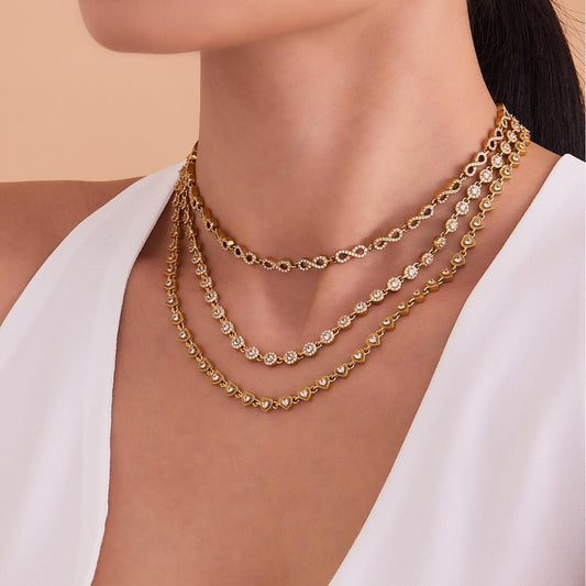 Model wearing 316L stainless steel heart bracelet and necklace with 5A cubic zirconia