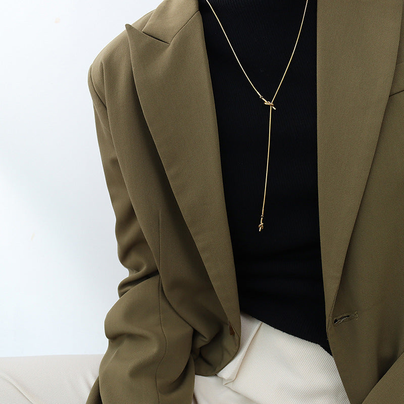 316L Stainless Steel Adjustable Heart Knot Tassel Sweater Necklace - Image 1