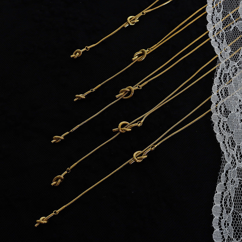 316L Stainless Steel Adjustable Heart Knot Tassel Sweater Necklace - Image 6