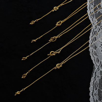 316L Stainless Steel Adjustable Heart Knot Tassel Sweater Necklace - Image 6