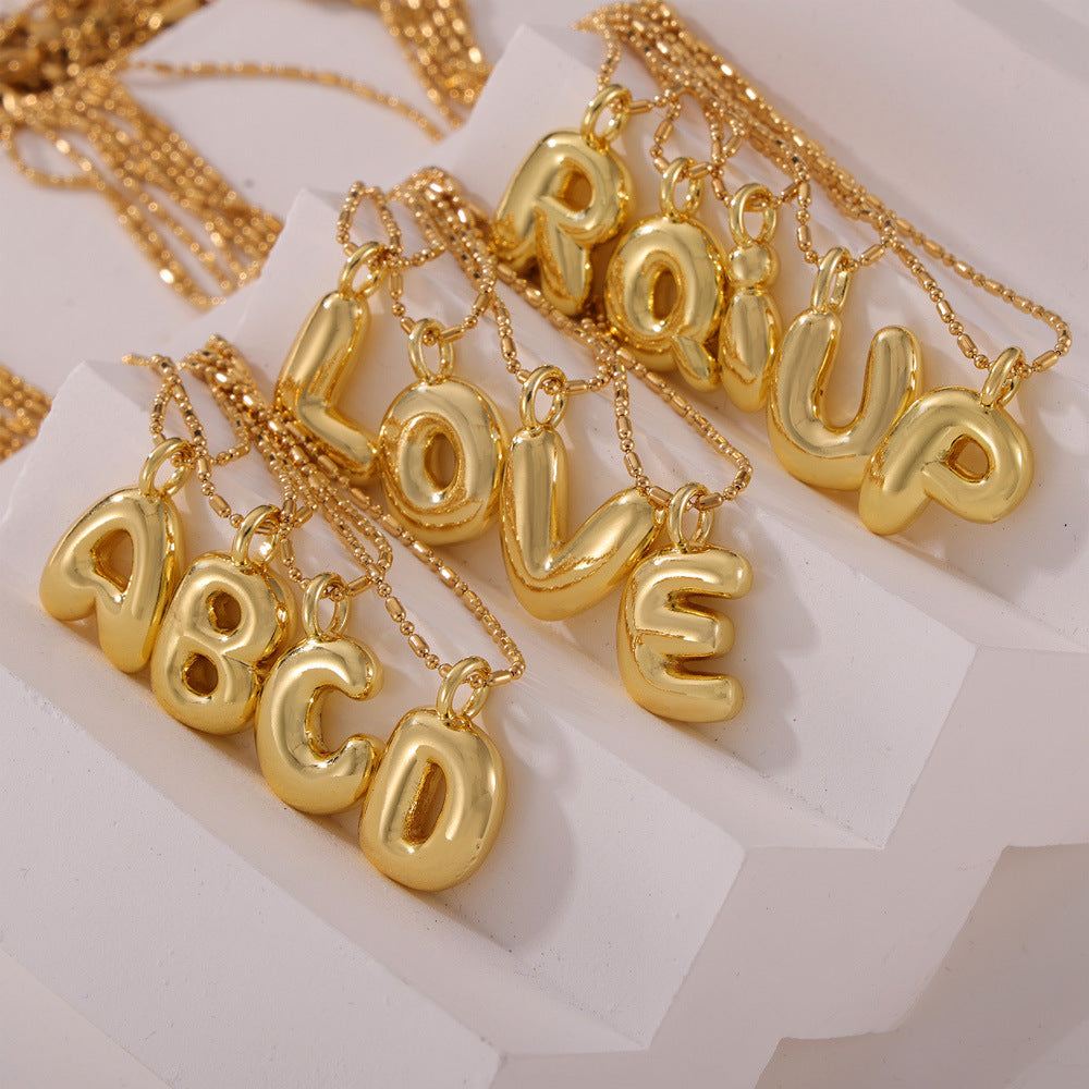 316L Stainless Steel 18K PVD Gold Balloon Letter Necklace made with 316L stainless steel and 18K PVD gold finish for wholesale jewelry buyers - image 7