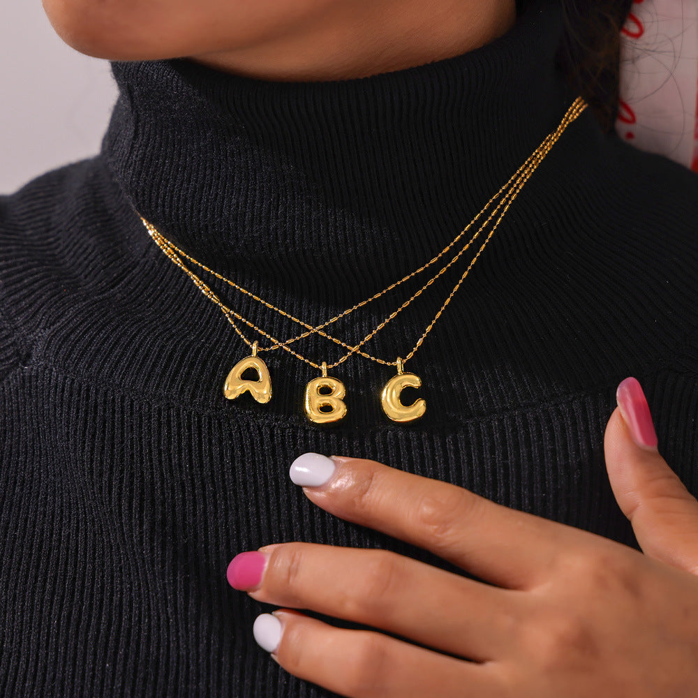 316L Stainless Steel 18K PVD Gold Balloon Letter Necklace made with 316L stainless steel and 18K PVD gold finish for wholesale jewelry buyers - image 8