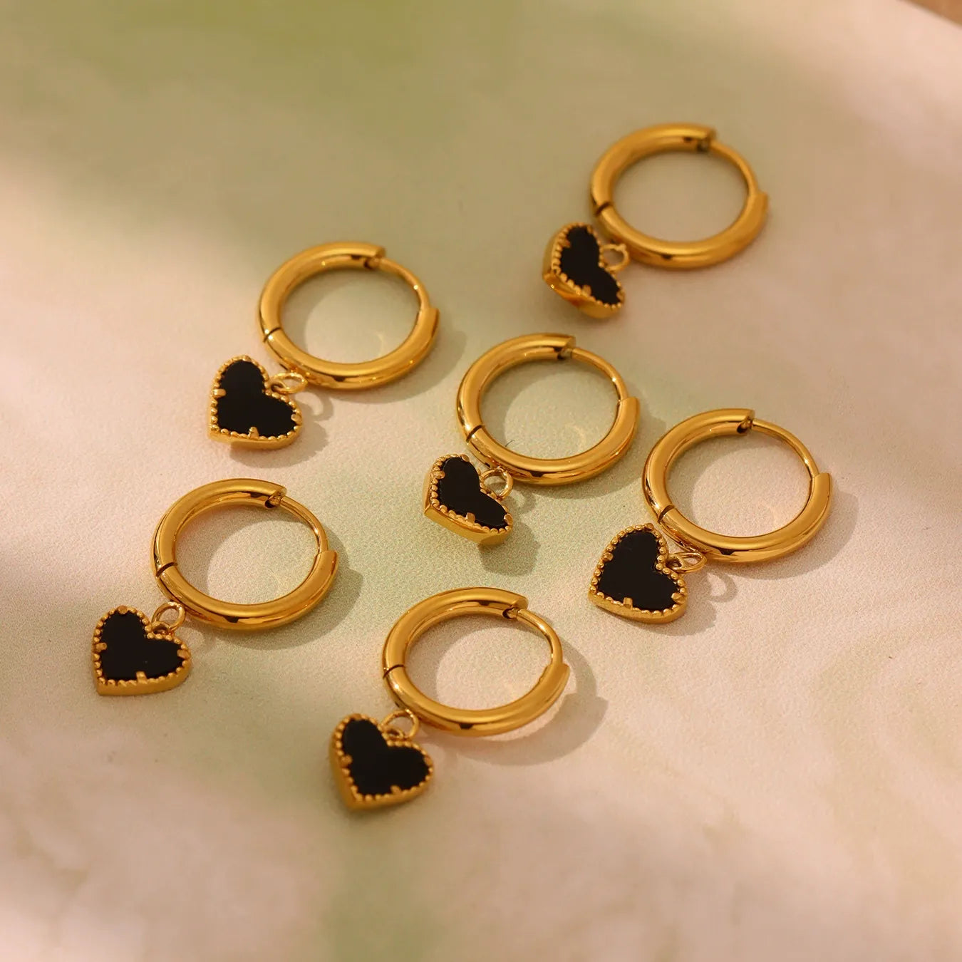 316L Stainless Steel Black Agate Heart Huggies - Image 1
