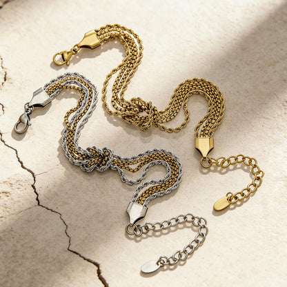 Flat lay of 316L stainless steel knot chain bracelet showing premium chain craftsmanship
