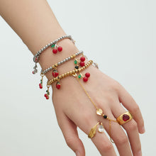316L stainless steel cherry and ladybug charm bracelet wrist close up