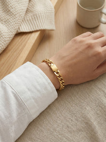 316L Stainless Steel U-clasp detail on Cuban chain bracelet, durable 18K gold PVD plating