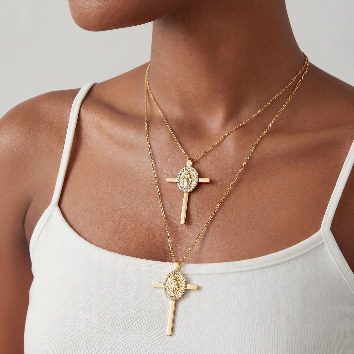 Gold plated 316L stainless steel cross necklace worn on models