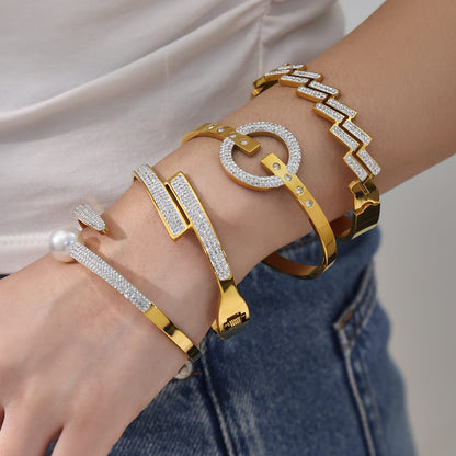 316L stainless steel pavé CZ circle buckle bangle in 18K PVD gold, wholesale bracelet