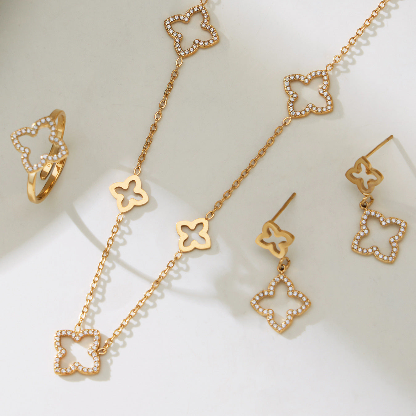 316L stainless steel CZ clover station necklace in gold, elegant long necklace design