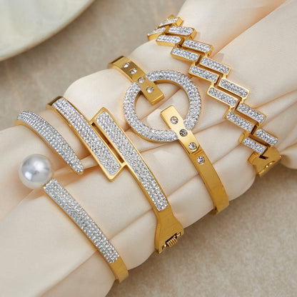 Display of 316L stainless steel CZ geometric bangle bracelet set, 18K PVD gold, wholesale