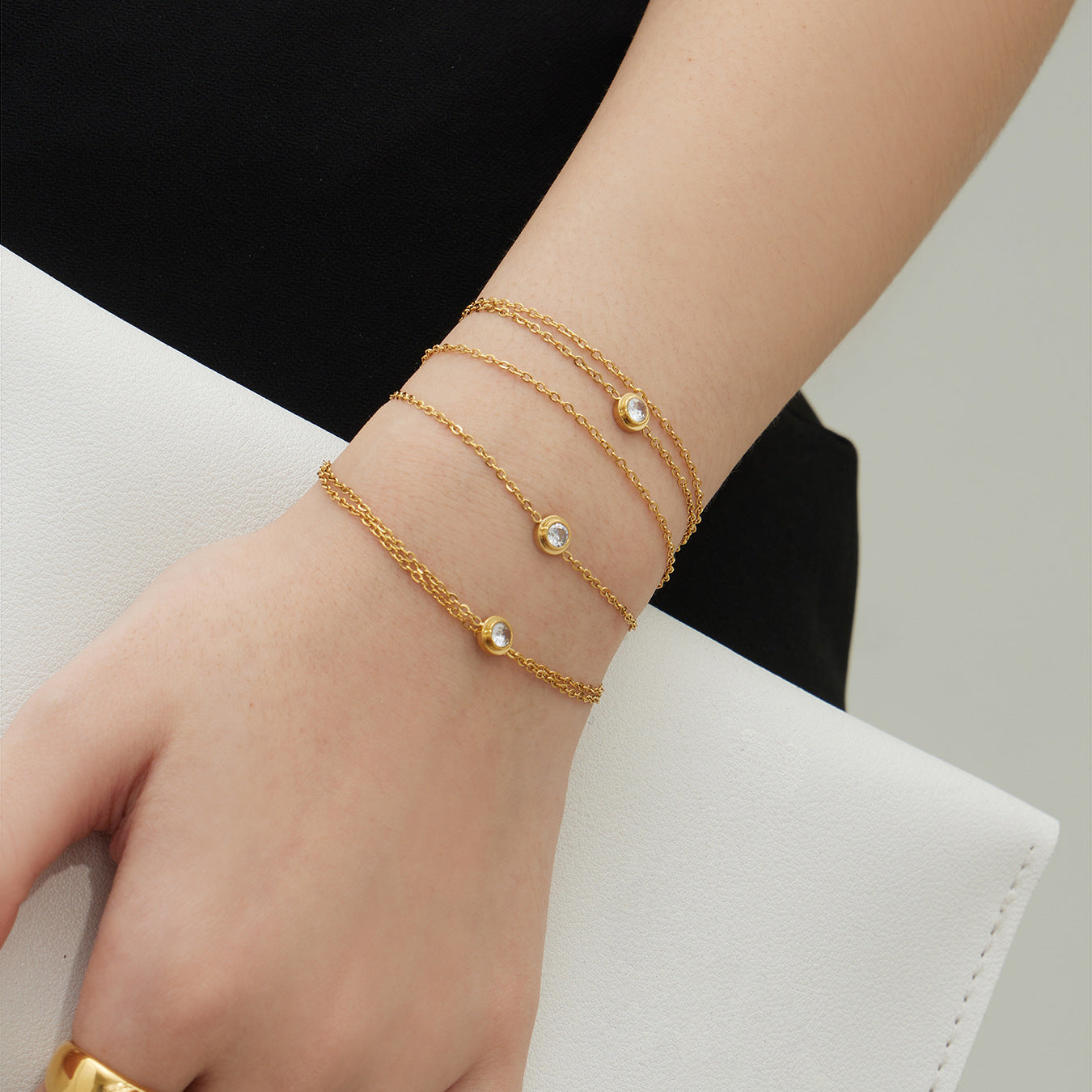 18K gold tone 316L stainless steel double-layer zircon bracelet worn on wrist