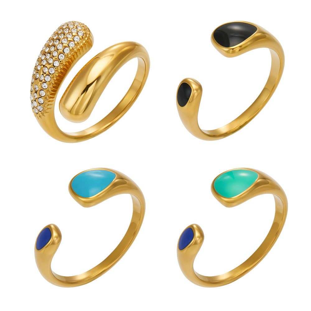 Set of 316L stainless steel open rings with black, blue and turquoise enamel details and a gold pavé cubic zirconia ring