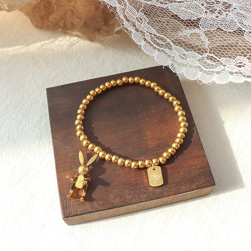 Close-up of 18K PVD gold plated bracelet