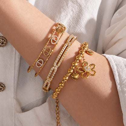 316L Stainless Steel 18K PVD Gold Flower Heart Zircon Bangle made with 316L stainless steel and 18K PVD gold finish for wholesale jewelry buyers - image 4