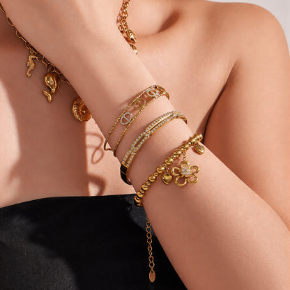 316L Stainless Steel 18K PVD Gold Flower Heart Zircon Bangle made with 316L stainless steel and 18K PVD gold finish for wholesale jewelry buyers - image 6