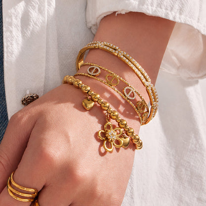 316L Stainless Steel 18K PVD Gold Flower Heart Zircon Bangle made with 316L stainless steel and 18K PVD gold finish for wholesale jewelry buyers - image 8