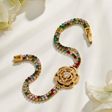 Gold multicolor zircon bracelet with large floral centerpiece shown in a close-up product view