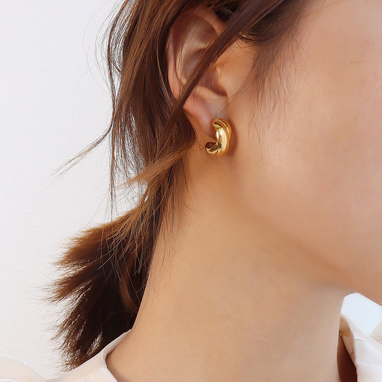 316L stainless steel gold minimalist chunky hoop earrings side profile on model
