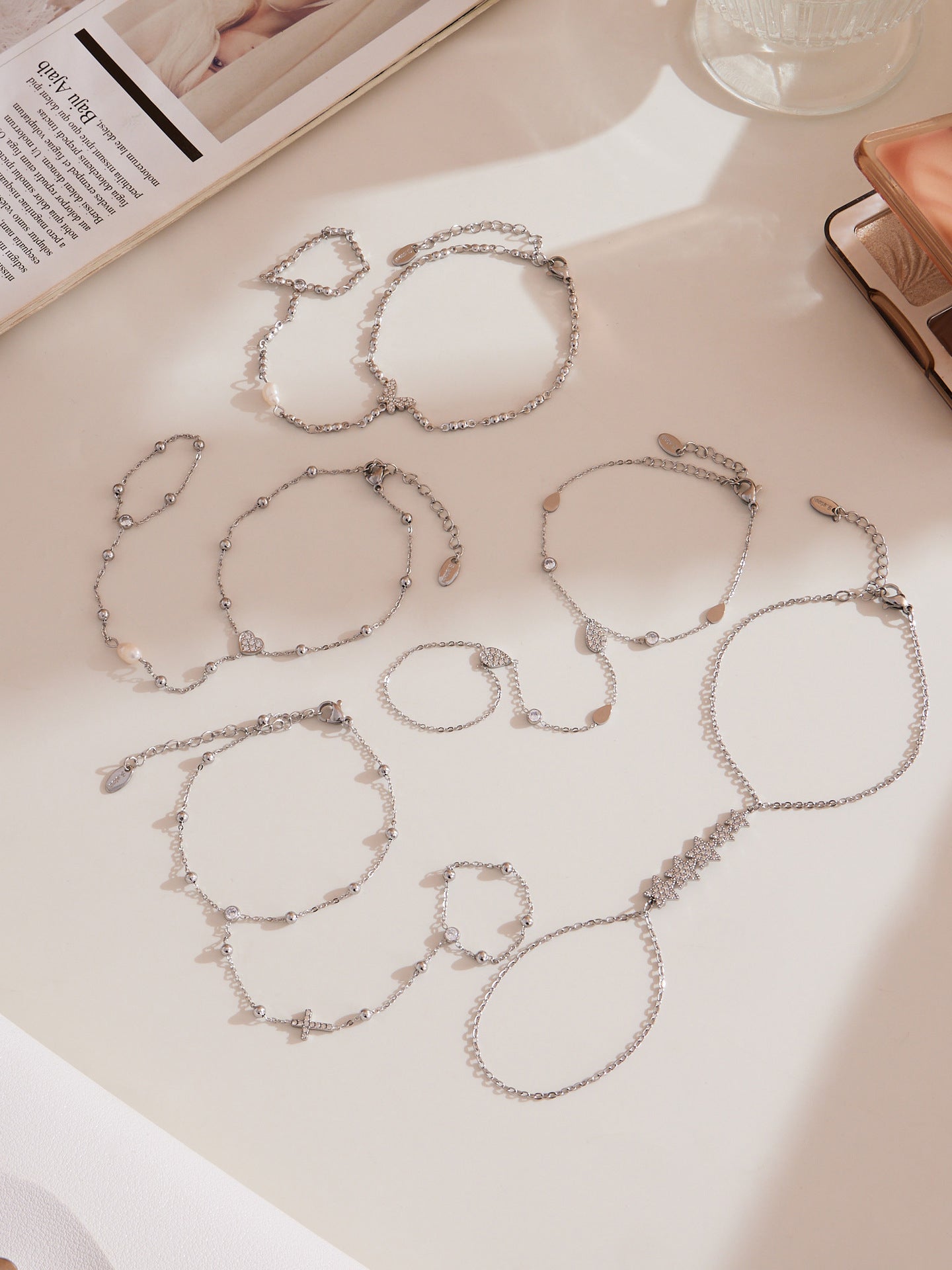 Gold hand chain bracelet with zircon embellishments