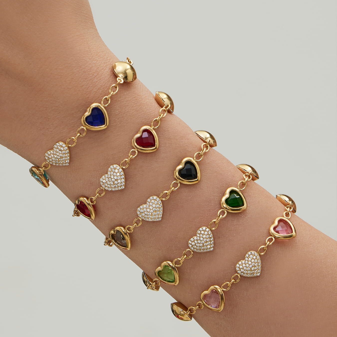 Multicolor glass stone heart charm bracelets made of 316L stainless steel close up detail