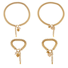 316L stainless steel heart charm necklace and bracelet set with zircon details and PVD gold plating