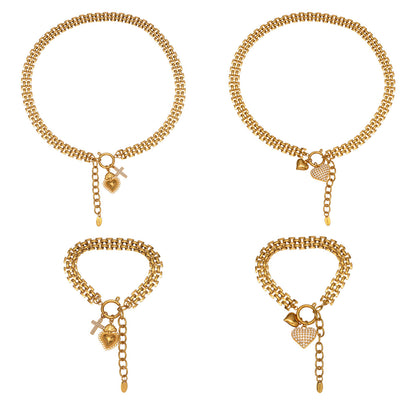 316L stainless steel heart charm necklace and bracelet set with zircon details and PVD gold plating